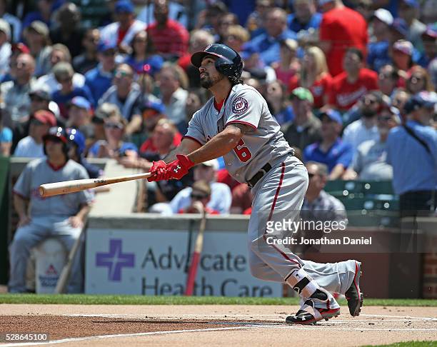 Anthony Rendon of the Washington Nationals follows the flight of his first inning solo home run against the Chicago Cubs at Wrigley Field on May 6,...