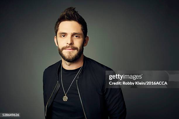 Thomas Rhett poses for a portrait at the 2016 American Country Countdown Awards People.com on May 1, 2016 in Inglewood, California.