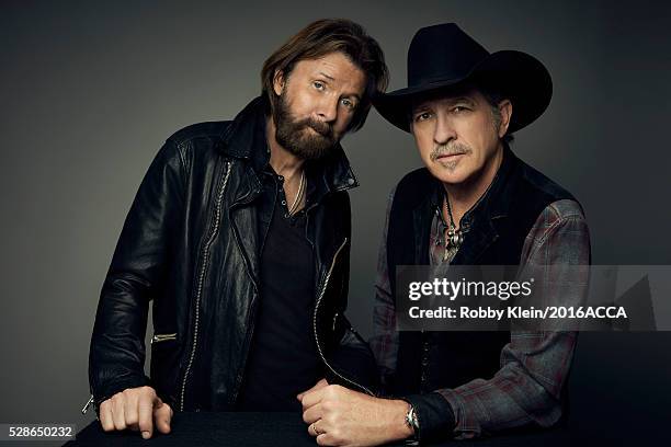 Brooks & Dunn pose for a portrait at the 2016 American Country Countdown Awards People.com on May 1, 2016 in Inglewood, California.