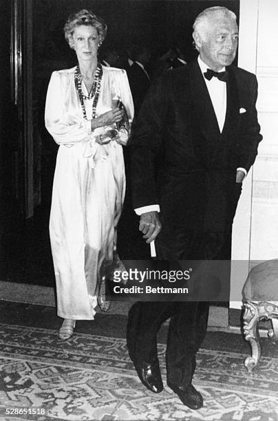 Automobile company president Gianni Agnelli and his rarely photographed wife, Marella-Caracciolo attend a dinner in honor of Britain's Queen...