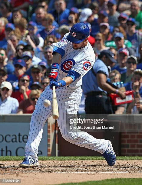 Ben Zobrist of the Chicago Cubs hits a three-run home run in the 5th inning against the Washington Nationals at Wrigley Field on May 6, 2016 in...