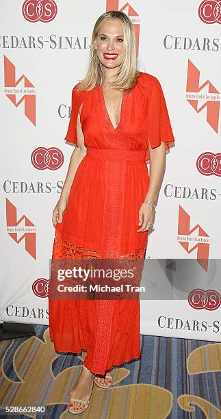 Molly Sims arrives at The Helping Hand of Los Angeles' 87th Anniversary Mother's Day luncheon held at the Beverly Wilshire Four Seasons Hotel on May...