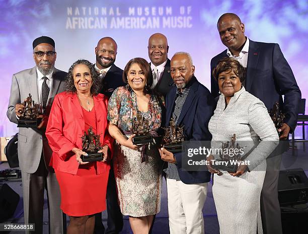 Kenneth Gamble, Cathy Hughes, Shannon Sanders ,Dyana Williams, H. Beecher Hicks III, Leon Huff, Shirley Caesar, and Jon Platt pose onstage during...