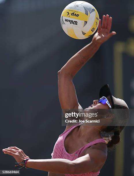 Angela Bensend serves the ball against Ali McColloch and Kelly Reeves during round one of the AVP Huntington Beach Open on May 06, 2016 in Huntington...