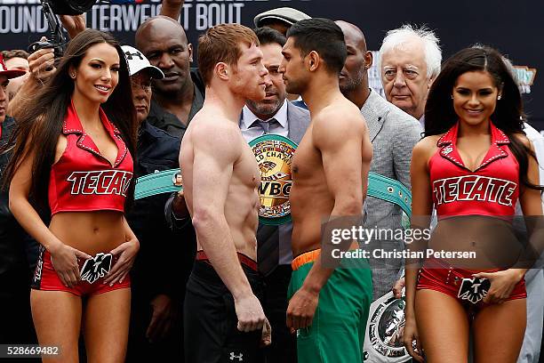 Canelo Alvarez and Amir Khan face off during their official weigh-in at T-Mobile Arena - Toshiba Plaza on May 6, 2016 in Las Vegas, Nevada. The two...