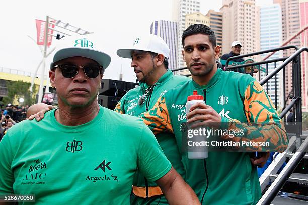 Amir Khan walks off the stage after his official weigh-in at T-Mobile Arena - Toshiba Plaza on May 6, 2016 in Las Vegas, Nevada. Khan will meet...