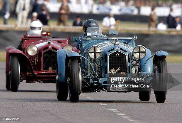 Two 1933 Alfa Romeo 8C 2300 Monza cars competing in the Brooklands Trophy, driven by entrants Klaus Werner and Hugh Taylor