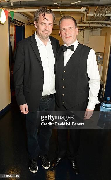 As Chris Moyles poses backstage with actor and playwright Matthew Perry after joining the cast of Matthew Perry's "The End Of Longing" in the role of...