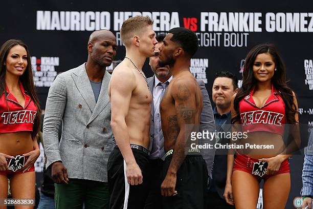 Jason Quigley and James De La Rosa face off during their official weigh-in at T-Mobile Arena - Toshiba Plaza on May 6, 2016 in Las Vegas, Nevada. The...