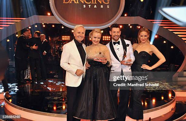 Klaus Eberhartinger, Verena Scheitz, Florian Gschaider and Mirjam Weichselbraun pose during the 'Dancing Stars' finals in Vienna at ORF Zentrum on...