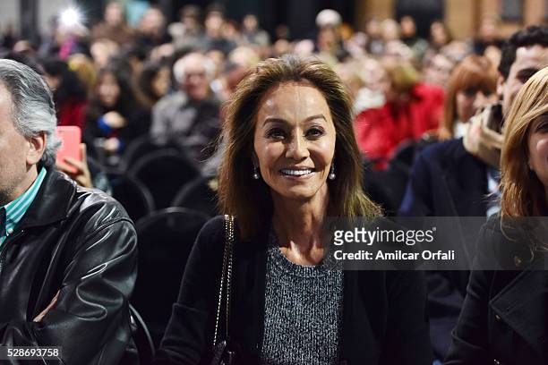 Isabel Preysler smiles during a Mario Vargas Llosa conference to present his book Cinco esquinas as part of Buenos Aires International Book Fair at...
