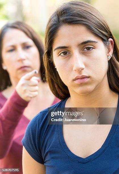 mother scolding her daughter - teen pregnancy stock pictures, royalty-free photos & images