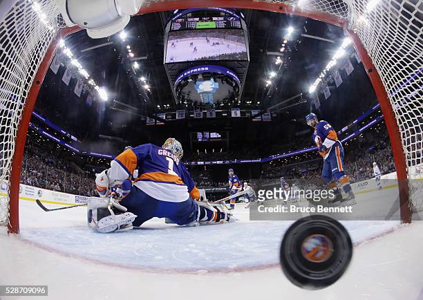 An overtime goal by Jason Garrison of the Tampa Bay Lightning against Thomas Greiss of the New York Islanders results in a 2-1 victory for the...
