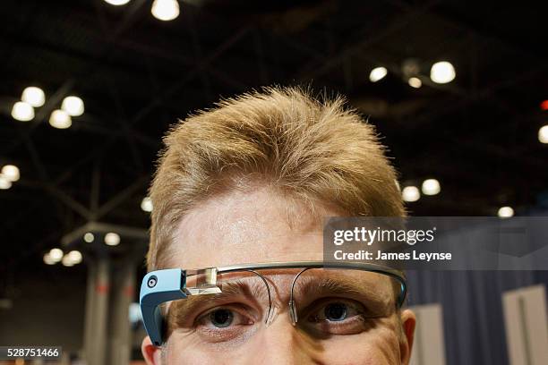 Cliff Redeker from Google wearing Google Glass, Google's internet connected glasses, while at the Bookexpo America at the Javitz Center in New York.