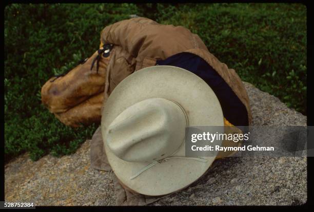 cowboy sleeping on a rock - cowboy sleeping stock pictures, royalty-free photos & images