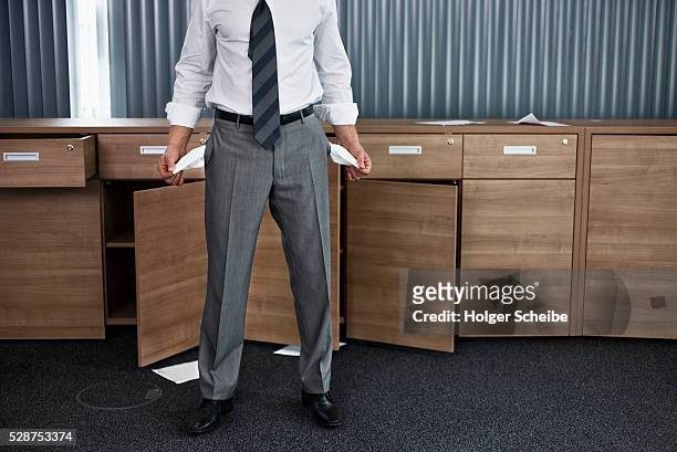 businessman with empty pockets - bust stock pictures, royalty-free photos & images