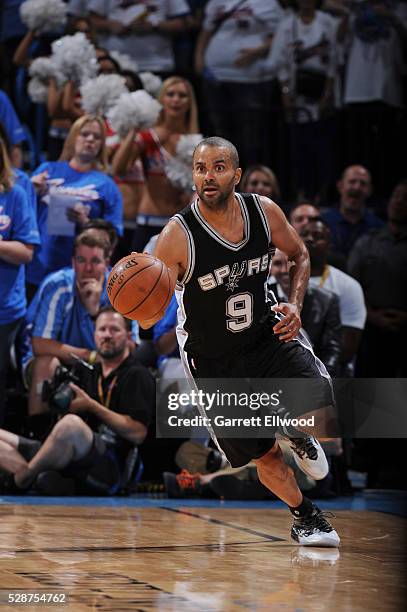 Tony Parker of the San Antonio Spurs handles the ball against the Oklahoma City Thunder in Game Three of the Western Conference Semifinals of the...