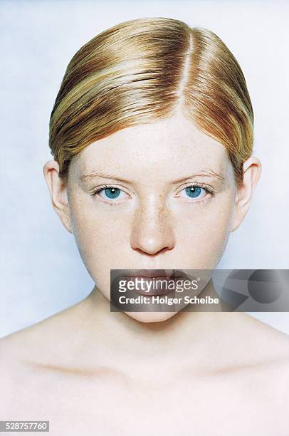 pale young woman with light freckles - pale complexion fotografías e imágenes de stock