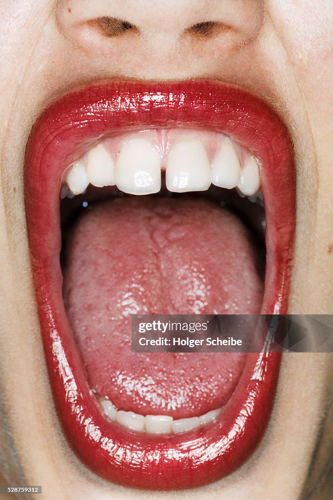 Mouth of a young woman (screaming)