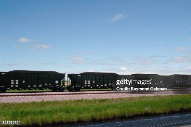 coal train heading west - coal transport stock pictures, royalty-free photos & images