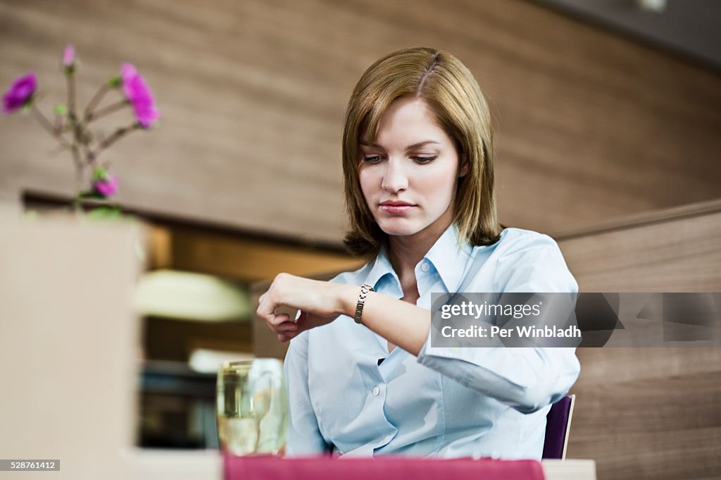 Woman waiting in cafe