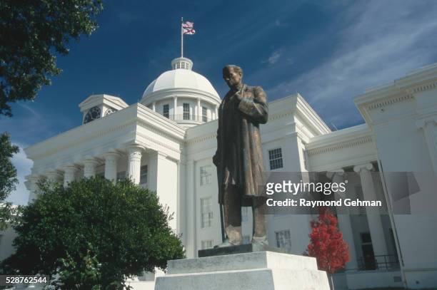 statue of james marion sims at alabama state capitol - montgomery alabama stock pictures, royalty-free photos & images