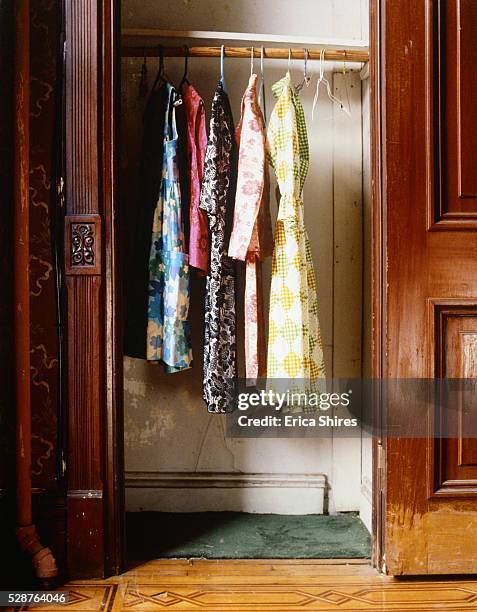 dresses hanging in closet - vintage dress stock pictures, royalty-free photos & images