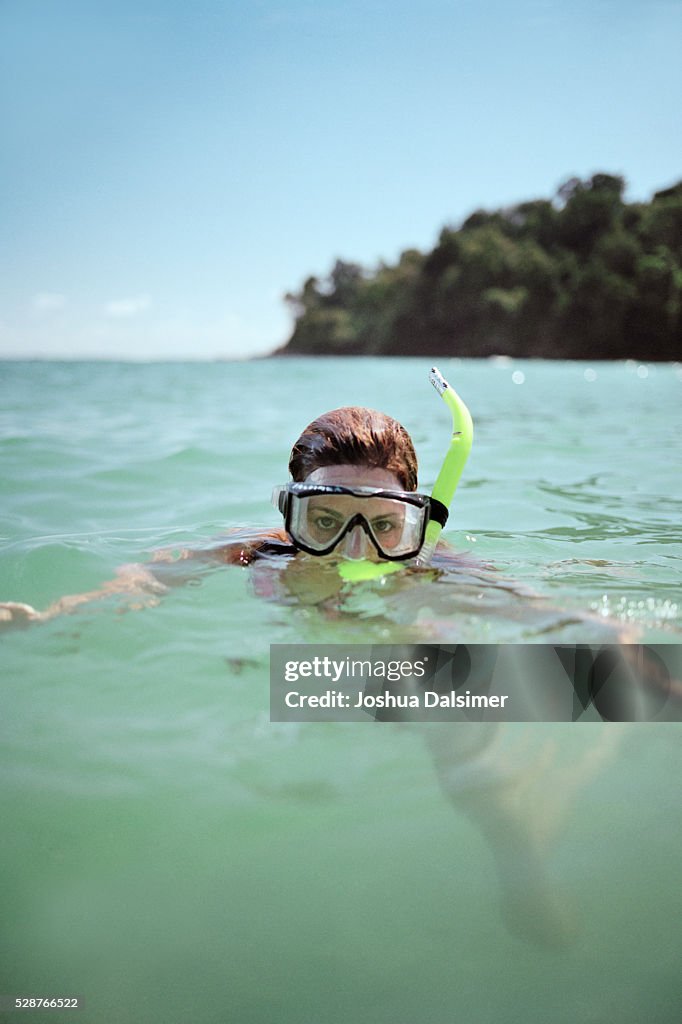 Woman snorkeling in the ocean