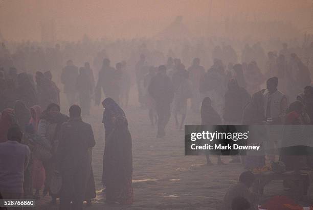 pilgrims in the mist - prayagraj bildbanksfoton och bilder