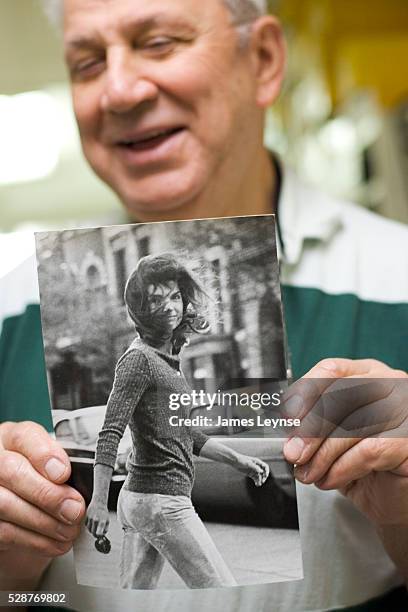 Ron Galella in his archives with his most famous picture "Windblown Jackie." Ron Galella is most famous for his dogged pursuit to photograph...