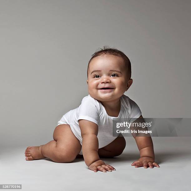 portrait of a baby boy - babygro stock pictures, royalty-free photos & images