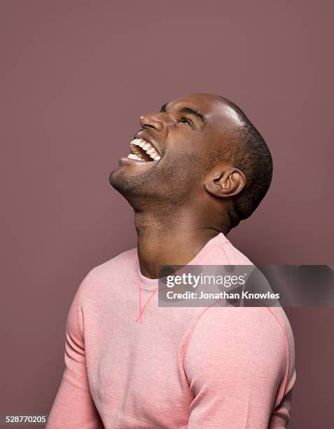 dark skinned looking up, laughing - freedom stock pictures, royalty-free photos & images