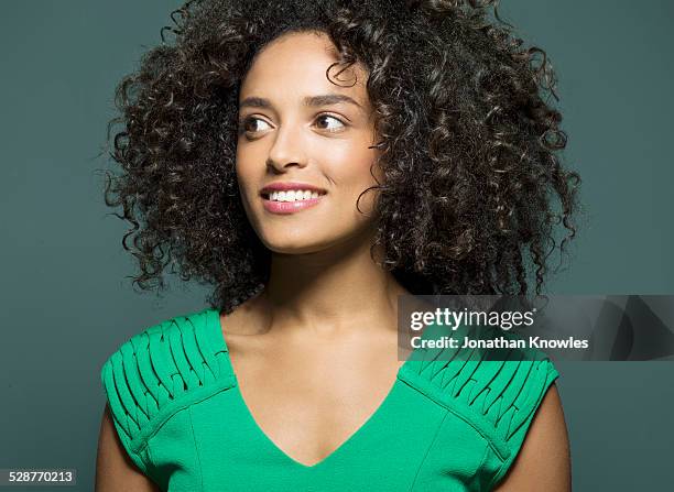 dark skinned female, looking away - budding starlets stock pictures, royalty-free photos & images