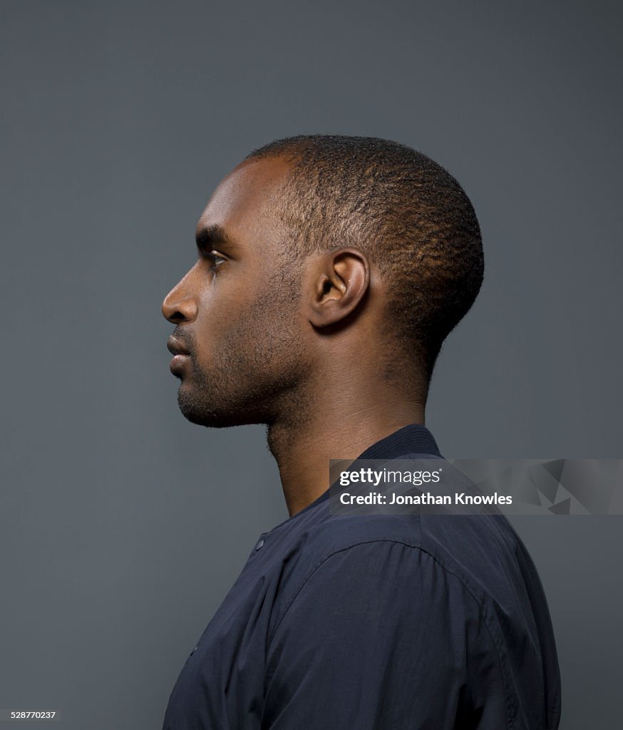 Side portrait of a dark skinned male