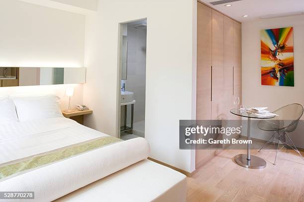 serviced apartment: studio-sized space - bedroom doorway stock pictures, royalty-free photos & images