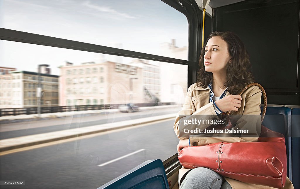 Woman riding on a bus
