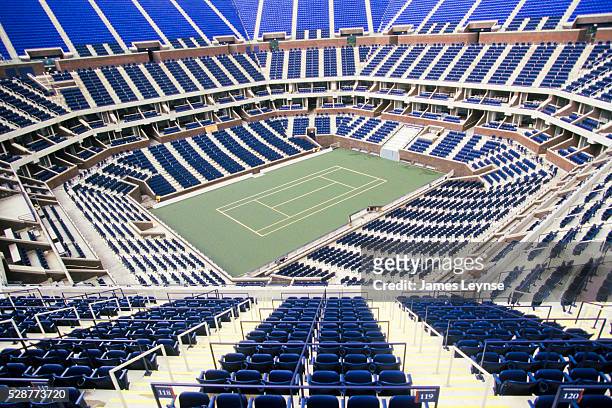 Arthur Ashe Stadium, home to the US Open, is located at the USTA Billie Jean King National Tennis Center in Flushing, Queens.