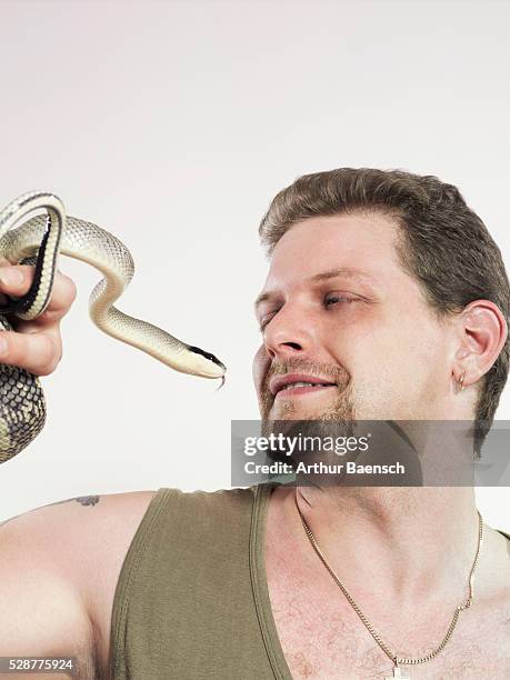 Python Snake With Man White Python Photos and Premium High Res Pictures - Getty Images