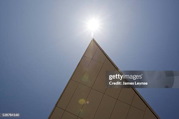 The sun shines directly above the pointed roof of Alice Tully at New York's Lincoln Center. Alice Tully recently reopened after a $159 million...