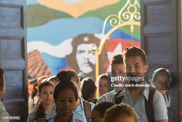 High School with Che Guevara mural in courtyard.