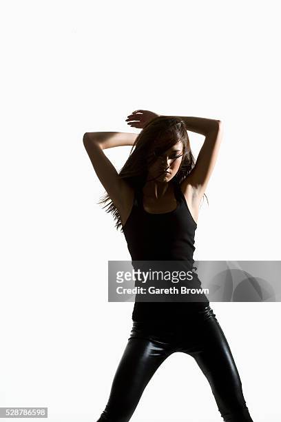 beautiful teenage girl - dancing silhouette stock pictures, royalty-free photos & images