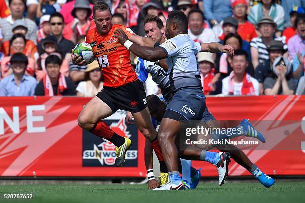 Riaan Viljoen of Sunwolves hands off during the round 11 Super Rugby match between the Sunwolves and the Force at Prince Chichibu Stadium on May 7,...