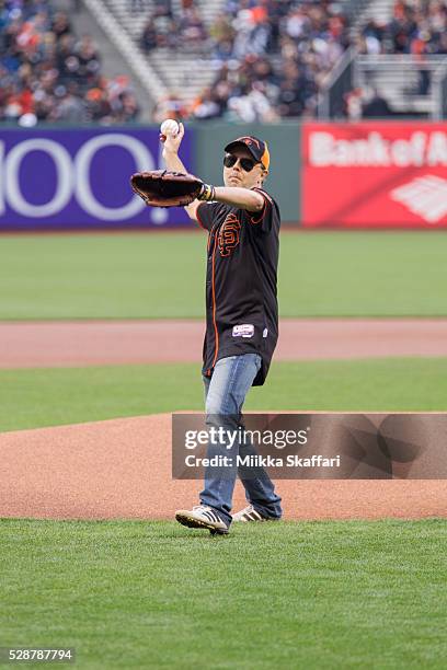 Drummer Lars Ulrich of Metallica throws the opening pitch at AT&T Park on May 6, 2016 in San Francisco, California.