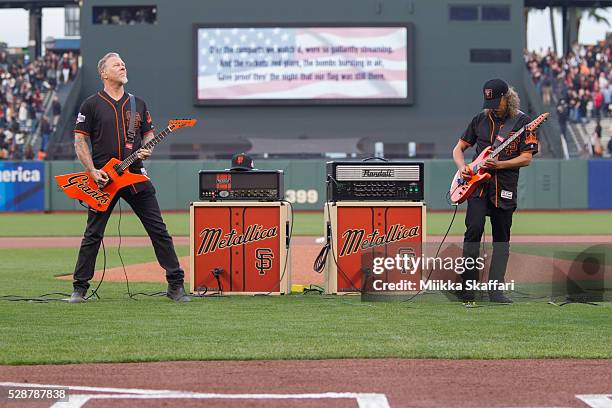 Guitarists James Hetfield and Kirk Hammett of Metallica perform The National Anthem at AT&T Park on May 6, 2016 in San Francisco, California.