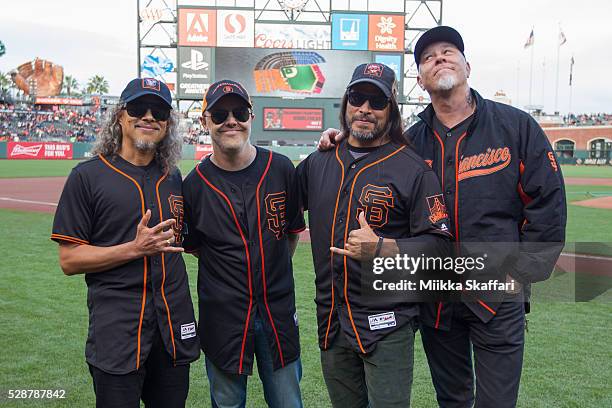 Guitarist Kirk Hammett , drummer Lars Ulrich, bassist Robert Trujillo and vocalist James Hetfield of Metallica pose for photos before peforming The...