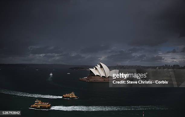 Storm clouds over the Sydney Opera House and Harbour Bridge. Sydney, Australia. Thursday, 3rd October, 2013.