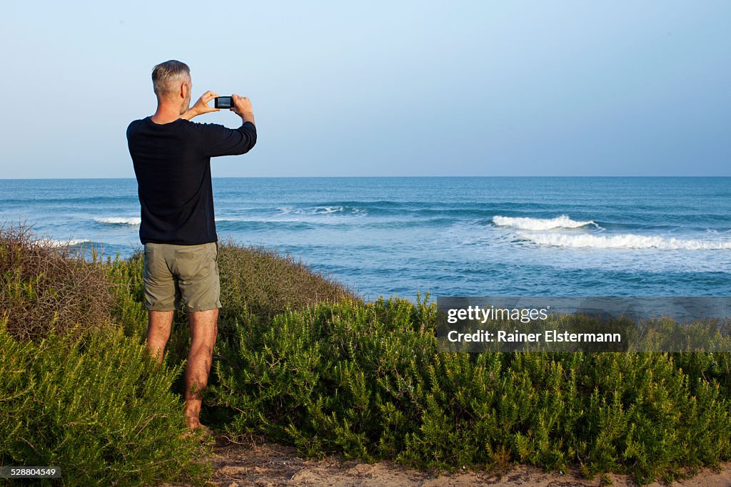 Man taking pictures