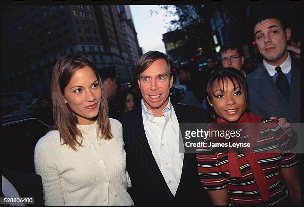 Actress Maxine Bahns and olympic gymnast Dominique Dawes join designer Tommy Hilfiger at Macy's as he unveils his new fragrance, Tommy Girl.