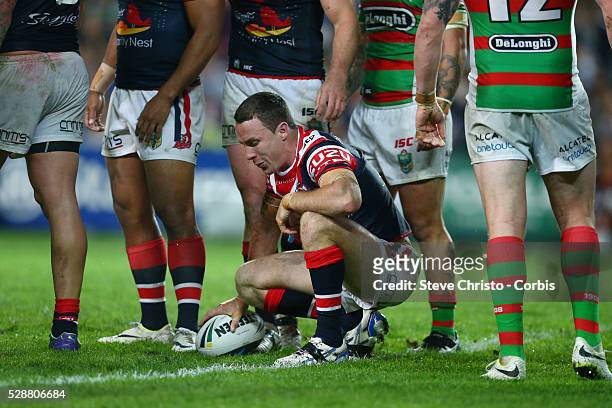 Roosters James Maloney on his knees after being stopped short of the line during the match against the Rabbitohs at Allianz Stadium. Sydney,...