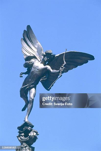 eros statue in london, england - amor stock-fotos und bilder